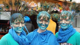 girls at the carnival in blue costumes