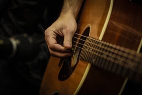 closeup guitar playing