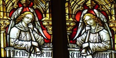 images of angels in the stained glass windows in the church