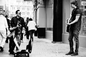 street musicians, monochrome photo