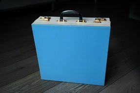 Blue vintage suitcase for singles