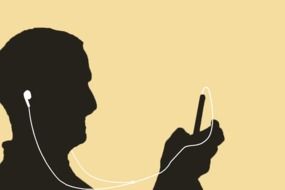 silhouette of man listening to music