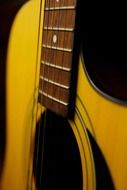 yellow guitar close up