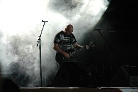 the performance of a rock guitarist live