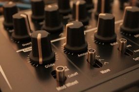 black knobs on the synthesizer