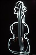 white silhouettes of a violin on a black background