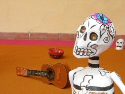 cardboard skull and musical instruments