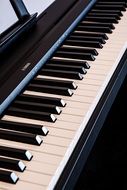 black and white piano keys close-up