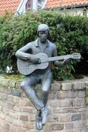 guitar musician sculpture