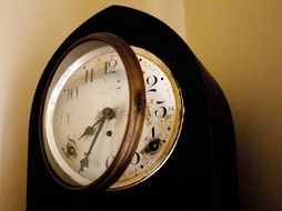 Time on the old antique clock