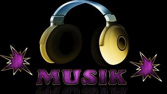Headphones over lettering on black background