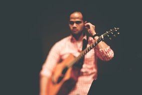 blurred guitarist
