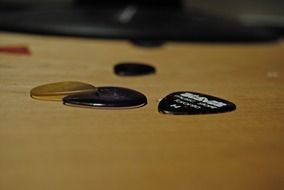 various guitar picks, plectrums