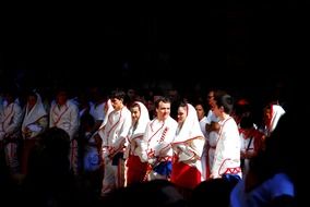 dancers in traditional costumes at a party