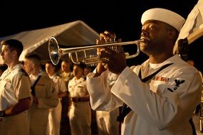 playing trumpeter