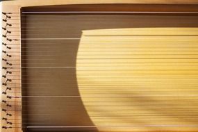 monochord, detail of wooden musical instrument