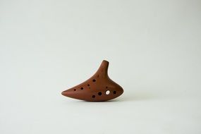 brown ceramic ocarina