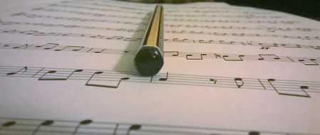 Pen on a music notes