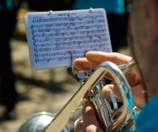 the fingers on a musical pipe