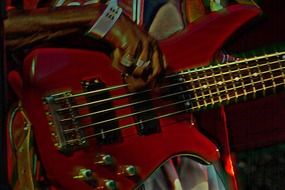 rock musician playing bass guitar
