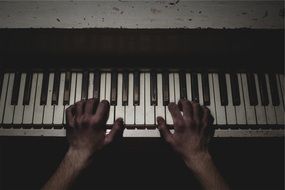 a man plays the piano