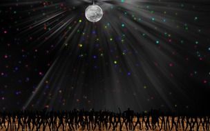 silhouettes of dancing people and a silver disco ball