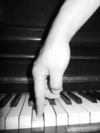 Playing hands on a piano