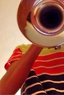 Man is playing on the trumpet