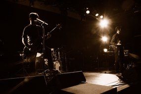 rock guitar player on dark scene