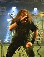Singer is singing on the concert