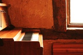 Old piano made of wood