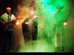 rock band play their music at the concert