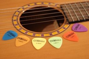 bright plectrums of guitar