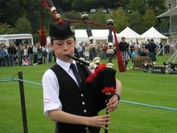 boy playing the bagpipe