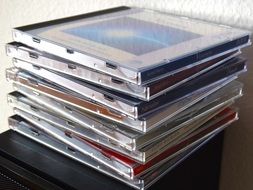 Cd disks in transparent containers