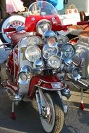 scooter with lots of headlights
