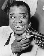 black and white photo of Louis Armstrong