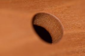 wooden surface with hole