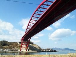 huge red bridge over the river