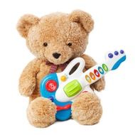 Teddy bear with toy guitar