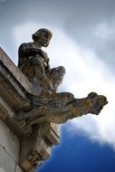 Stone castle statue of Troubadour