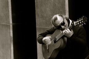 spanish guitar player playing flamenco