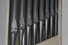 silver metal organ pipes