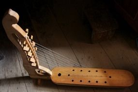 Photo of wooden musical instrument,harp