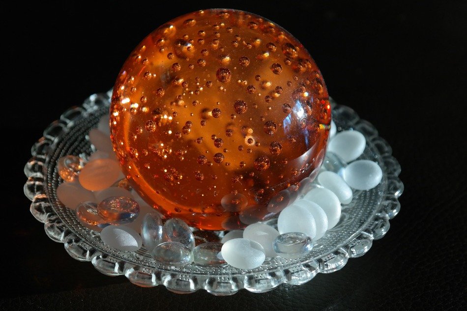 Orange ball on the glass