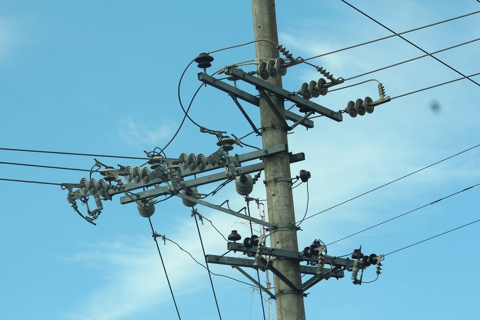 electric cables near poles closeup