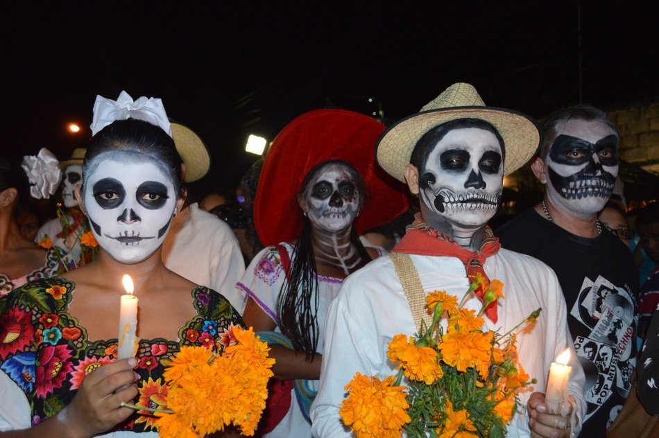 people are painted as skeletons at the festival of the day of the dead in mexico