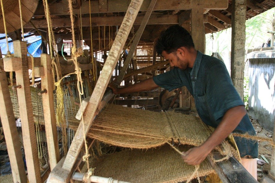 man at the loom in India