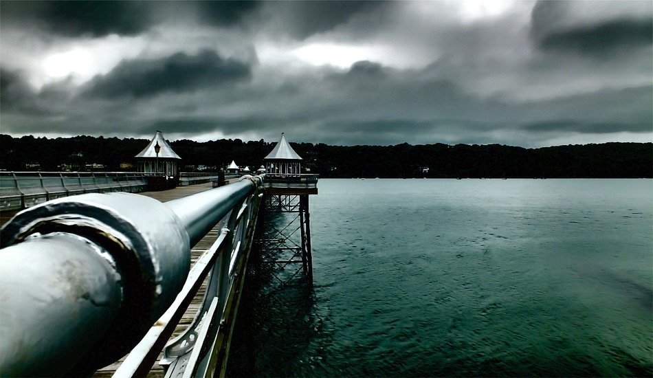 black and white photo of the pipeline through the reservoir