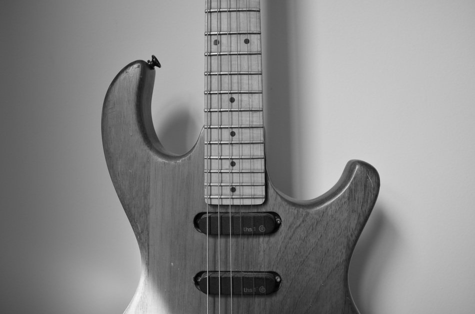 old guitar in black and white background